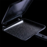 Inside view of Ridge Monkey Connect 10th Anniversary frying pan, showcasing its non-stick surface and sleek design.